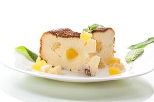 sweet baked cottage cheese casserole with nuts and candied fruits photo