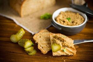 fried buckwheat croutons with cooked homemade pate photo