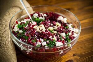 dietary salad of boiled beets with walnuts and cottage cheese photo