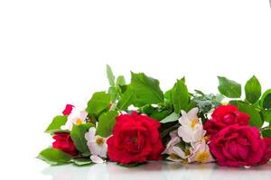big bouquet of beautiful red and pink roses on white background photo