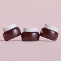 Round packaging of cream. Jar of cream brown color isolated on background color photo