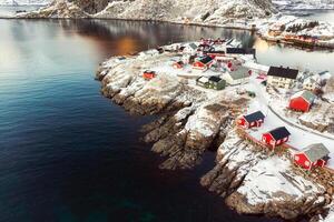 Colorful Hamnoy village on snow in winter at Lofoten photo