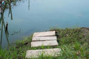 Stair down to fish ponds in farm photo
