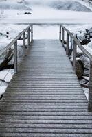 Snow frost on wood bridge photo