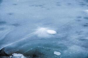 Ice crack natural phenomenon on arctic seashore photo