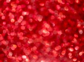 Red Sparkling Glitter bokeh Background. photo