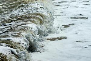 Heavy waves in the storm season. photo