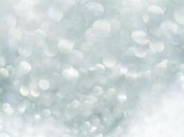 Soft silver sparkling bokeh background. photo