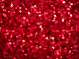 Red Sparkling Glitter bokeh Background. photo