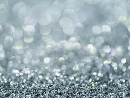 Silver Sparkling Glitter bokeh Background. photo