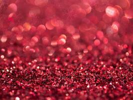 Red Sparkling Glitter bokeh Background. photo