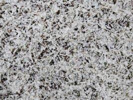 Texture of fallen snow on objects photo