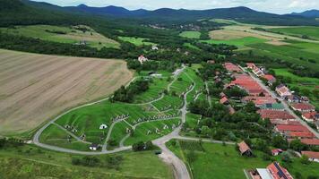 Aerial orbiting zoom view of wine cellars Hercegkut in Hungary video