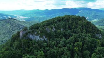 Aerial north orbiting view of castle Muran ruins in Slovakia video