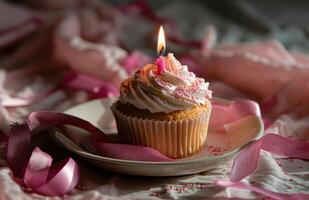 AI generated a pink cupcake with a candle and pink ribbons photo