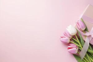 AI generated Pink gift box with ribbon bow and bouquet of tulips on isolated pastel pink background. AI Generated photo