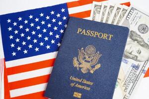 US passport with USA dollar money, American citizen in United States of America. photo