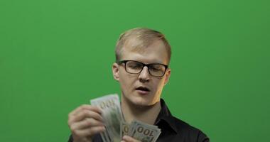 Man received paper money for a major deal. Counting money chroma key video