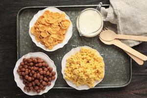 Three Bowl Cereal with Milk photo