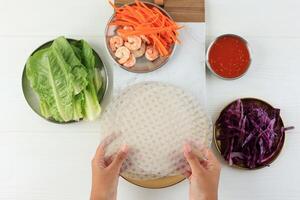 Process Making Vietnam Summer Spring Roll with Rice Paper photo