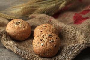 Tasty Organic Bun Bread with Sesame Seed and Sun Flower Seed. photo