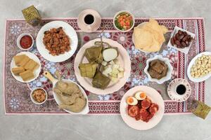 Top View Ketupat Lebaran Menu, Indonesian Celebratory Dish of Rice Cake photo