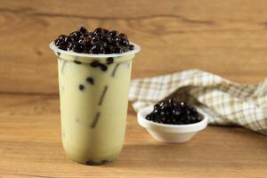 Matcha Green Tea Milk Latte with Boba Bubble Tapioca Pearl photo