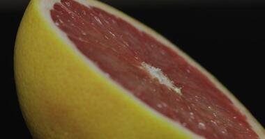 Delicious grapefruit cut for squeezing fresh juice. Grapefruit half video