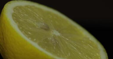 Delicious lemon cut for squeezing fresh juice. Lemon half video