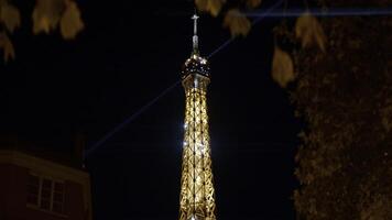 France, Paris - September 10, 2022. Flashing Eiffel Tower. Action. Twinkling lights of Eiffel Tower at night in Paris. Beautiful light representation of Tower in Paris photo