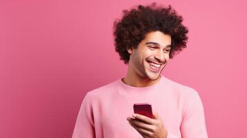 AI generated Portrait of a happy young man using mobile phone over pink background photo