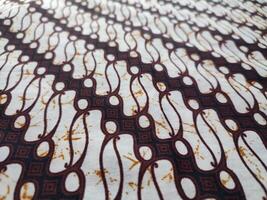 el patrones en tradicional batik paño proporcionar un visual y filosófico Mira foto