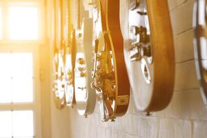 Guitars that were kept in the music practice room It is a guitar that is provided for musicians to practice and learn before performing in order to reduce the mistake of playing guitar on stage. photo