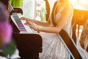 Beautiful piano background are set by the window in the morning waiting for the pianist to come to practice in the morning to reduce the mistake of having to perform the piano performance at a concert photo