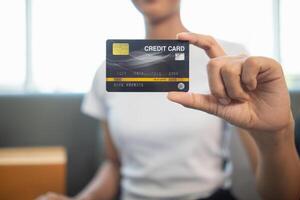 Credit card are popularly used today era because they are convenient for purchasing products from regular stores and online stores can purchase products through application by paying with credit card. photo