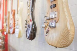 Guitars that were kept in the music practice room It is a guitar that is provided for musicians to practice and learn before performing in order to reduce the mistake of playing guitar on stage. photo