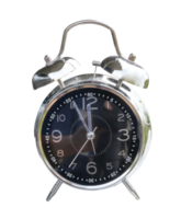 Black and silver alarm clock isolated with clipping path in png file format. 12 o'clock noon and lunch time reminder. Time concept