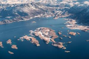 Aerial view of archipelago in blue ocean on winter photo