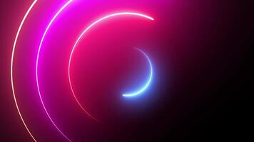 Loop animation technology shows multicolored lines and circular motions on a dark background. Abstract futuristic animated neon light circles with space for text. Hypnotic lights motion video