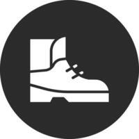 icono de vector de botas