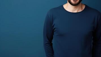 AI generated Man in a dark blue t-shirt on a blue background, t-shirt mockup photo