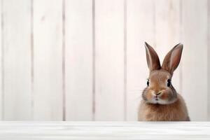 AI generated Cute bunny on table against blurred background. Space for text photo