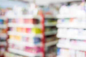 Blurred scene of aisle shelf colorful retail supermarket photo