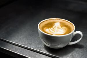 Coffee latte flower art shape in freezer photo