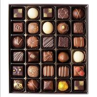 AI generated chocolate box with many chocolates photo