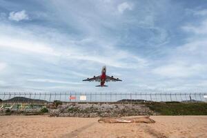 Commercial airplane soaring take off at the airport photo