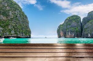 Wood table top on Beautiful sea in Maya bay photo