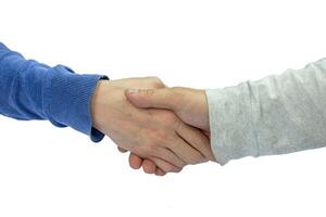 Young man hand casual shaking hands on isolated background photo