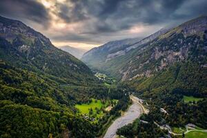 French Alps landscape of Giffre valley mountain range in the sunset at Sixt Fer a Cheval, France photo