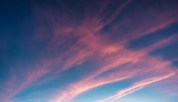 Colorful striped cloud and blue sky in the sunset photo